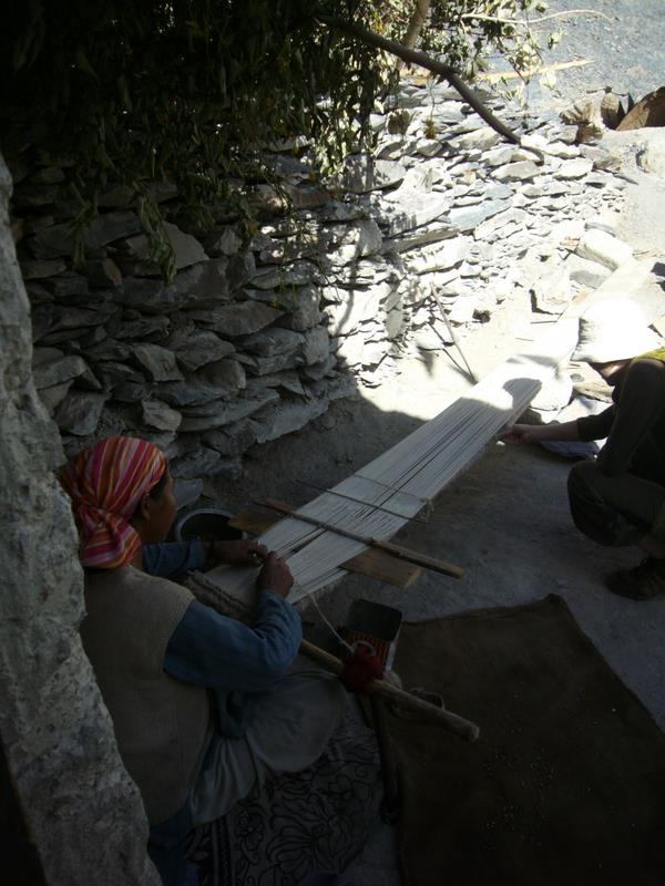 Dolma weaves carpets.